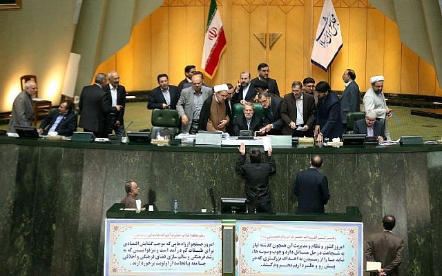 File: Iran's Parliament during a session in Tehran on October 13, 2015 in which the parliament approved its nuclear deal with world powers, paving the way for the historic agreement curbing Tehran's atomic program to take effect and for the eventual lifting of sanctions. ( AFP / Tasnim / Meghdad Madadi) File: Iran's Parliament during a session in Tehran on October 13, 2015 in which the parliament approved its nuclear deal with world powers, paving the way for the historic agreement curbing Tehran's atomic program to take effect and for the eventual lifting of sanctions. ( AFP / Tasnim / Meghdad Madadi)