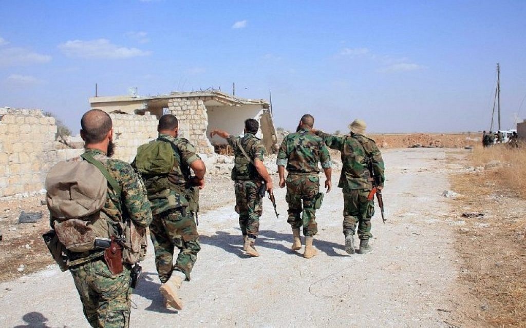 Syrian soldiers in the area around Kweiris air base, in the eastern Aleppo province, Syria, on October 16, 2015 (AFP/George Ourfalian) Syrian soldiers in the area around Kweiris air base, in the eastern Aleppo province, Syria, on October 16, 2015 (AFP/George Ourfalian)