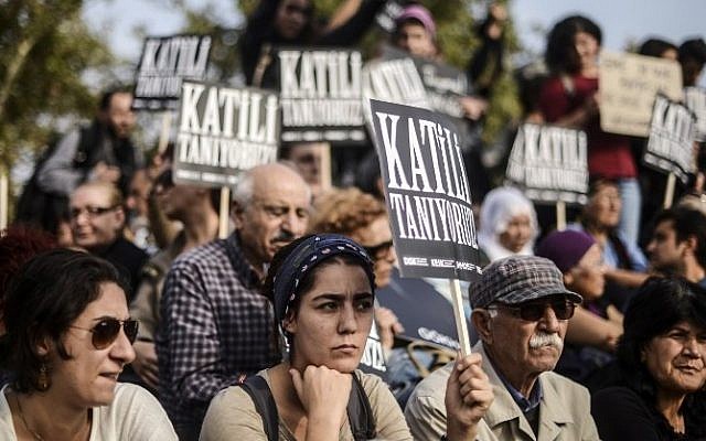 People mourn during a commemoration for the victims of the October 10 bombings on October 17, 2015 in Istanbul. The death toll from the double suicide bombing in Ankara stands at 102, prosecutors in the capital said on October 16. (AFP/ BULENT KILIC) People mourn during a commemoration for the victims of the October 10 bombings on October 17, 2015 in Istanbul. The death toll from the double suicide bombing in Ankara stands at 102, prosecutors in the capital said on October 16. (AFP/ BULENT KILIC)