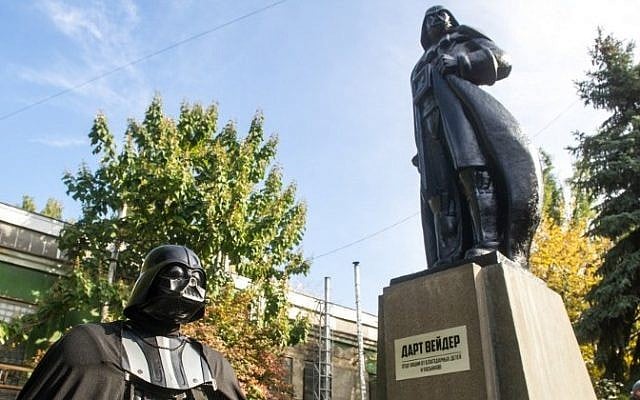A participant dressed as Darth Vader, a character from the 'Star Wars' film, takes part in an inauguration ceremony of a Darth Vader monument, formerly a statue of Soviet founder Lenin, in the southern Ukrainian city of Odessa on October 23, 2015. (AFP/ VOLODYMYR SHUVAYEV) A participant dressed as Darth Vader, a character from the 'Star Wars' film, takes part in an inauguration ceremony of a Darth Vader monument, formerly a statue of Soviet founder Lenin, in the southern Ukrainian city of Odessa on October 23, 2015. (AFP/ VOLODYMYR SHUVAYEV)