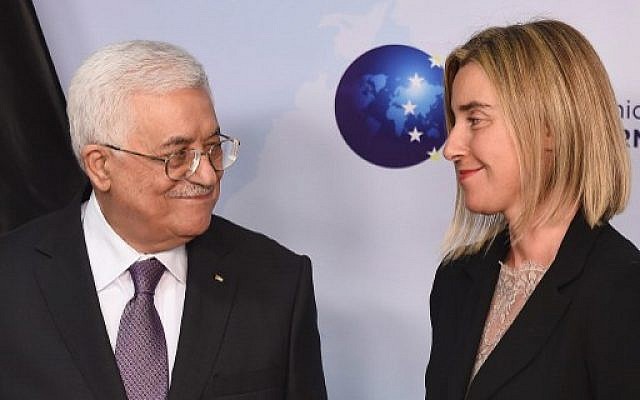 EU Foreign policy chief Federica Mogherini (R) and Palestinian Authority President Mahmoud Abbas smile during a joint press conference at the European Union External Action headquarters in Brussels on October 26, 2015. (AFP PHOTO / EMMANUEL DUNAND) EU Foreign policy chief Federica Mogherini (R) and Palestinian Authority President Mahmoud Abbas smile during a joint press conference at the European Union External Action headquarters in Brussels on October 26, 2015. (AFP PHOTO / EMMANUEL DUNAND)
