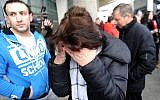 Relatives react at Pulkovo international airport outside Saint Petersburg after a Russian plane with 224 people on board crashed in a mountainous part of Egypt's Sinai Peninsula on October 31, 2015. (AFP PHOTO/OLGA MALTSEVA)