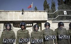 Iranian riot policemen standing guard outside the Bahraini Embassy in Tehran as Iranian hardliners hold a demonstration against the Bahraini government's suppression of protests led by the mainly-Shiite opposition in the kingdom, April 15, 2011. (AFP/Behrouz Mehri, File)