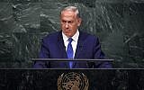 Prime Minister Benjamin Netanyahu stares silently at the crowd while addressing the 70th Session of the United Nations General Assembly at the UN in New York on October 1, 2015 (AFP Photo/Jewel Samad)