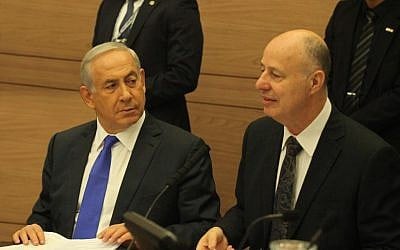 Prime Minister Benjamin Netanyahu attends a meeting of the Knesset Foreign Affairs and Defense Committee alongside the committee's chairman, MK Tzach Hanegbi, on Monday, October 26, 2015 (Knesset spokesman)