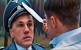 Illustrative: Lt. Aldo Raine, played by Brad Pitt, preparing to carve a swastika into the forehead of Col. Hans Landa, played by Christoph Waltz, in Quentin Tarantino's Holocaust-themed spaghetti western "Inglourious Basterds." (Screen capture)