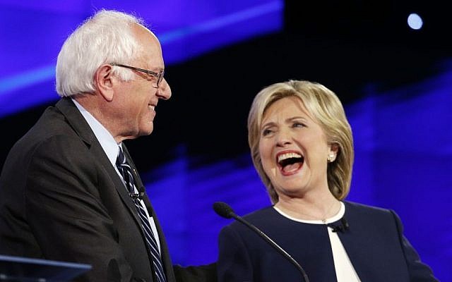 Sen. Bernie Sanders, of Vermont and Hillary Rodham Clinton laugh during the CNN Democratic presidential debate, Oct. 13, 2015. (Photo by AP Photo/John Locher) Sen. Bernie Sanders, of Vermont and Hillary Rodham Clinton laugh during the CNN Democratic presidential debate, Oct. 13, 2015. (Photo by AP Photo/John Locher)
