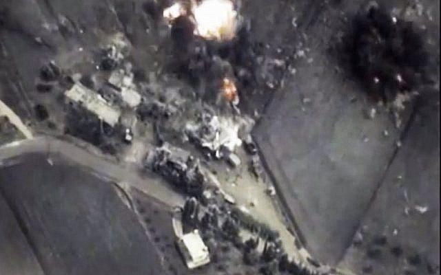 Footage from the Russian Defense Ministry official web site on Thursday, October 1, 2015 a bomb explosion is seen in Syria. (Russian Defense Ministry Press Service/AP) Footage from the Russian Defense Ministry official web site on Thursday, October 1, 2015 a bomb explosion is seen in Syria. (Russian Defense Ministry Press Service/AP)