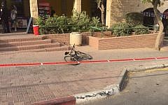 The bicycle a 13-year-old boy was riding before he was stabbed in the Pisgat Zeev neighborhood of Jerusalem on October 12, 2015. (Israel Police Spokesperson's Unit)