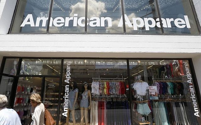 In this Wednesday, July 9, 2014, file photo, passers-by walk in front of the American Apparel store in the Shadyside neighborhood of Pittsburgh. (AP/Keith Srakocic, File) In this Wednesday, July 9, 2014, file photo, passers-by walk in front of the American Apparel store in the Shadyside neighborhood of Pittsburgh. (AP/Keith Srakocic, File)