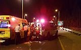 Magen David Adom paramedics at the scene of a multiple stabbing attack near Hadera, on October 11, 2015. (Assaf Brezinger/Magen David Adom)