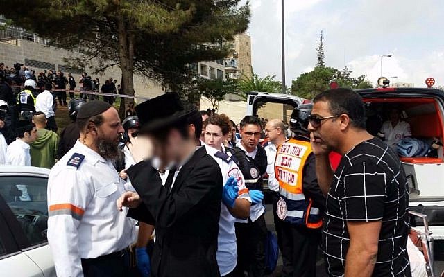 Emergency medical personnel at the scene of a stabbing attack in Jerusalem on October 9, 2015 (Magen David Adom) Emergency medical personnel at the scene of a stabbing attack in Jerusalem on October 9, 2015 (Magen David Adom)