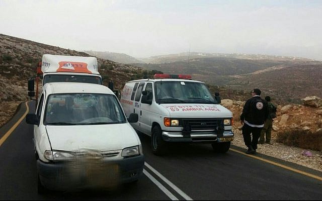 An ambulance is seen on a road in the West Bank where a man was stabbed by a Palestinian terrorist on Sunday, October 25, 2015. (Magen David Adom)
