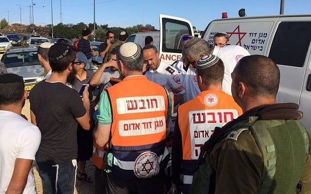 Emergency medical services arrive at the scene of a car accident caused by rock throwers near the West Bank settlement of Shiloh on Oct. 9, 2015. (Magen David Adom) Emergency medical services arrive at the scene of a car accident caused by rock throwers near the West Bank settlement of Shiloh on Oct. 9, 2015. (Magen David Adom)