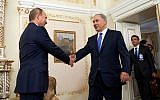 Russian President Vladimir Putin, left, greeting Israeli Prime Minister Benjamin Netanyahu in Moscow, September 21, 2015. (Israeli Embassy in Russia/Flash90/via JTA)