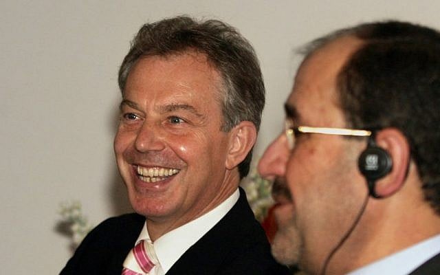 A Monday, May 22, 2006 file photo showing then-British prime minister Tony Blair, left, smiling as he speaks to the media with new Iraqi Prime Minister Nouri al-Maliki at the Iraqi Prime Minister's Office in Baghdad, Iraq. (AP Photo/Khalid Mohammed, Pool, File) A Monday, May 22, 2006 file photo showing then-British prime minister Tony Blair, left, smiling as he speaks to the media with new Iraqi Prime Minister Nouri al-Maliki at the Iraqi Prime Minister's Office in Baghdad, Iraq. (AP Photo/Khalid Mohammed, Pool, File)