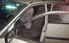 The car in which Israeli couple Naama and Eitam Henkin were shot dead in a terror attack near the West Bank settlement of Itamar on Thursday, October 1, 2015. (United Hatzalah)