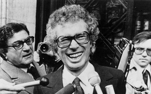 In this Jan. 31, 1980, file photo, Ken Taylor, Canadian Ambassador to Iran, laughs as he answers questions during a meeting with journalists outside the Canadian Embassy in Paris. (AP Photo/File)