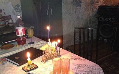 Celebrating the fourth night of Channukah in an informal settlement. (Courtesy)