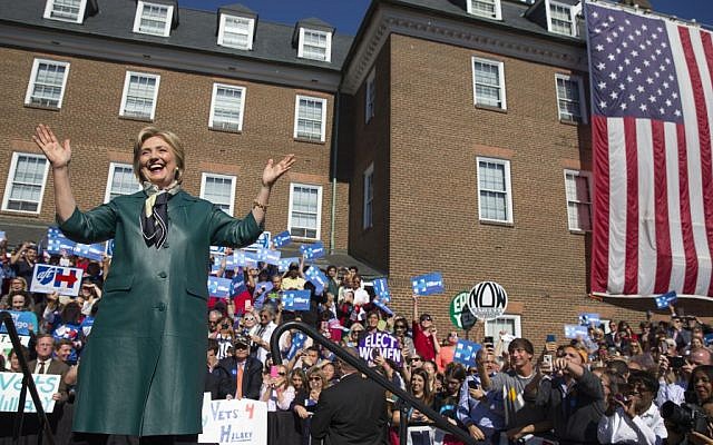Democratic presidential candidate, former Secretary of State Hillary Rodham Clinton smiles as she arrives for a campaign rally, Friday, Oct. 23, 2015, in Alexandria, Va. (AP Photo/Evan Vucci) Democratic presidential candidate, former Secretary of State Hillary Rodham Clinton smiles as she arrives for a campaign rally, Friday, Oct. 23, 2015, in Alexandria, Va. (AP Photo/Evan Vucci)