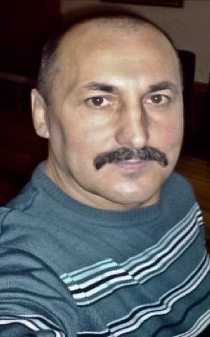 Alexandr Agheenco, a Russian citizen based in Moldova's breakaway region of Trans-Dniestr, and called "the Colonel" by his cohorts. (Moldova Police via AP) Alexandr Agheenco, a Russian citizen based in Moldova's breakaway region of Trans-Dniestr, and called "the Colonel" by his cohorts. (Moldova Police via AP)