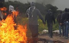 Arab Israeli youths are seen during clashes in the northern town of Umm Al-Fahm in March 2009. (Kobi Gideon/Flash90)