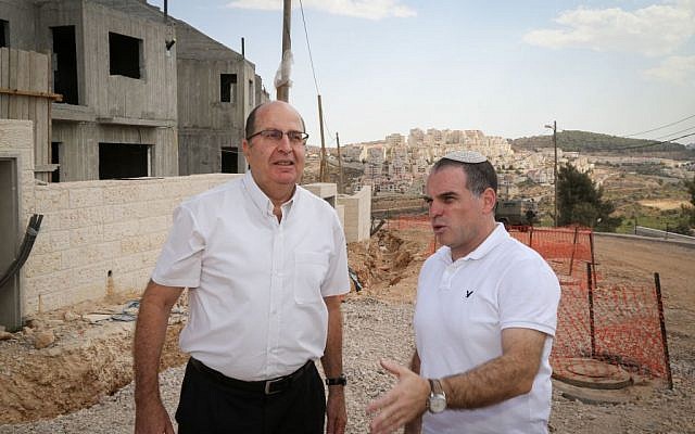 Defense Minister Moshe Ya'alon (left), with Efrat Mayor Oded Ravivi (right) in the Etzion Bloc settlement on September 30, 2015 (Gershon Elinson/Flash90) Defense Minister Moshe Ya'alon (left), with Efrat Mayor Oded Ravivi (right) in the Etzion Bloc settlement on September 30, 2015 (Gershon Elinson/Flash90)