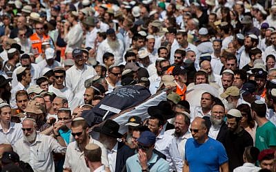 Friends and family carry the bodies of Israeli couple Naama and Eitam Henkin during their funeral at Har HaMenuchot Cemetery in Jerusalem on Friday, October 2, 2015. (Yonatan Sindel/Flash90) Friends and family carry the bodies of Israeli couple Naama and Eitam Henkin during their funeral at Har HaMenuchot Cemetery in Jerusalem on Friday, October 2, 2015. (Yonatan Sindel/Flash90)