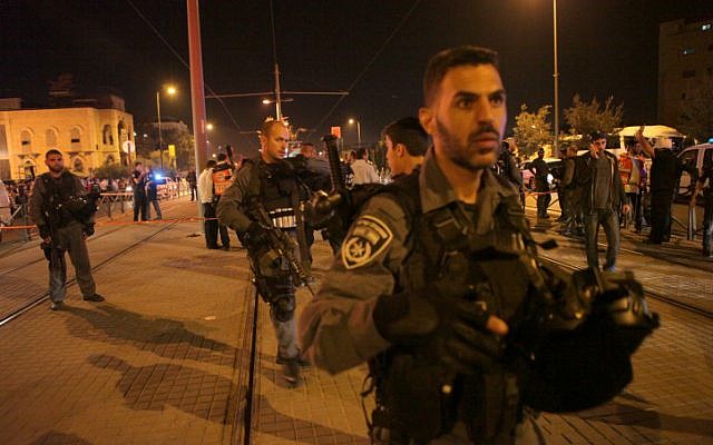 Israeli police at the scene where a Palestinian terrorist stabbed an 15-year-old man outside Jerusalems Old City early Sunday morning, October 4, 2015. (Flash90) Israeli police at the scene where a Palestinian terrorist stabbed an 15-year-old man outside Jerusalems Old City early Sunday morning, October 4, 2015. (Flash90)