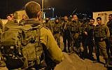 Soldiers of the Givati brigade prepare for a late night mission in the West Bank city of Nablus on October 7, 2015. (IDF Spokesperson/FLASH90)