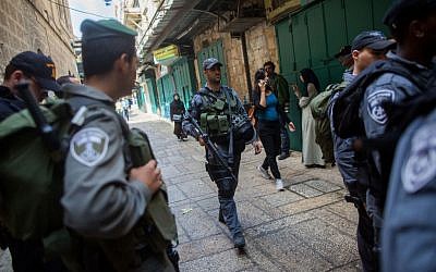 Illustrative: Israeli security forces seen patrolling near the Lions’ Gate of Jerusalem's Old City on October 7, 2015. (Yonatan Sindel/Flash90)
