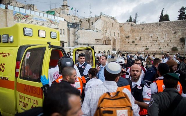 Ambulances at the Western Wall following a terror attack where a Palestinian woman stabbed an Israeli man near Lions’ Gate of Jerusalem's Old City on October 07, 2015. (Yonatan Sindel/Flash90)