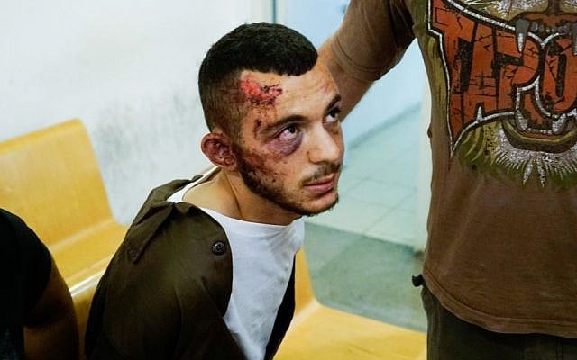 Suspect Alaa Raed Ahmad Zayoud at Haifa Magistrate's Court (Basel Awidat/Flash90)