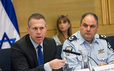 Public Security Minister Gilad Erdan and Interim Police Chief Benzi Sau attend an Internal Affairs committee meeting in the Knesset on the recent terror attacks in Jerusalem, on October 12, 2015. (Miriam Alster/FLASH90)