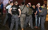 Security forces at the scene of shooting and stabbing attack at the Central Bus Station in the southern city of Beersheba, on October 18, 2015. (Meir Even Haim/Flash90)
