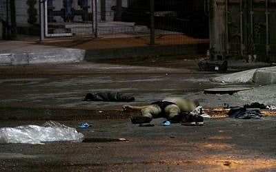 The body of the terrorist at Beersheba Central Bus Station, after an attack on October 18, 2015 (Photo by Meir Even Haim/Flash90)