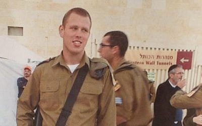 A reproduction of a photo of Sergeant Omri Levi, 19, killed in a Beersheba terror attack, October 18, 2015. (Roy Alima/Flash90)