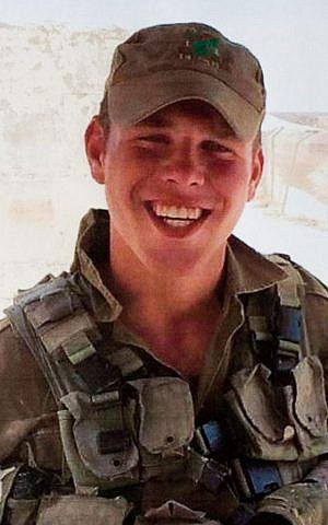 Reproduction photo of Golani soldier Omri Levi, who was killed in a shooting attack at the central bus station in the southern city of Beersheba on Sunday, October 18, 2015 (Roy Alima/Flash90) Reproduction photo of Golani soldier Omri Levi, who was killed in a shooting attack at the central bus station in the southern city of Beersheba on Sunday, October 18, 2015 (Roy Alima/Flash90)