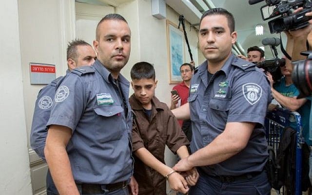 13-year-old Palestinian Ahmed Manasra seen at the Jerusalem Magistrate's Court on October 25, 2015. (Yonatan Sindel/Flash90) 13-year-old Palestinian Ahmed Manasra seen at the Jerusalem Magistrate's Court on October 25, 2015. (Yonatan Sindel/Flash90)