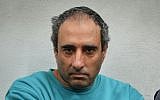 Hagai Amir attends a court session in Tel Aviv over a Faebook post that police say incited against President Reuven Rivlin, on Wednesday, October 28, 2015 (Flash90)