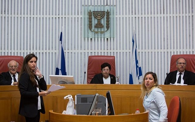 Israel Supreme Court Chief Justice Miriam Naor (seated, center) during a court hearing, October 29, 2015. (Yonatan Sindel/Flash90) Israel Supreme Court Chief Justice Miriam Naor (seated, center) during a court hearing, October 29, 2015. (Yonatan Sindel/Flash90)