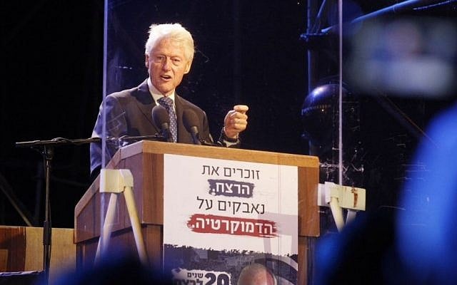 Former US president Bill Clinton delivers a speech behind a bulletproof glass during a rally marking 20 years since the assassination of the late Israeli prime minister Yitzhak Rabin at Tel Aviv's Rabin Square on October 31, 2015. (Miriam Alster/Flash90) Former US president Bill Clinton delivers a speech behind a bulletproof glass during a rally marking 20 years since the assassination of the late Israeli prime minister Yitzhak Rabin at Tel Aviv's Rabin Square on October 31, 2015. (Miriam Alster/Flash90)
