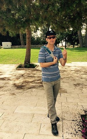 Doron Bar on the grounds of Mount Herzl, the national cemetery where he has spent much time researching his book, "xxx" (Jessica Steinberg/Times of Israel)