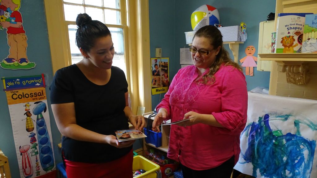 Lisa Fuentes, left, a home visit coordinator, and Family Place Executive Director Haley Wiggins reviewing training material. (Suzanne Pollak/via JTA) Lisa Fuentes, left, a home visit coordinator, and Family Place Executive Director Haley Wiggins reviewing training material. (Suzanne Pollak/via JTA)