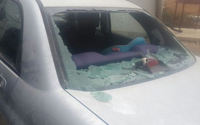The smashed window of an Israeli vehicle after an attack by rock throwing Palestinians near the West Bank settlement of Tekoa, October 7, 2015. (Courtesy) The smashed window of an Israeli vehicle after an attack by rock throwing Palestinians near the West Bank settlement of Tekoa, October 7, 2015. (Courtesy)