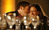 Illustrative: A couple out on the town in Jerusalem. (AP Photo/Oded Balilty)