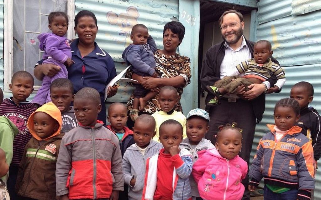 South African Jewish politician Jack Bloom with children at a daycare center in Soweto. (Courtesy)