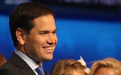 Presidential candidate Sen. Marco Rubio smiles on stage with family members after the Republican Presidential Debate in Boulder, Colorado, on October 28, 2015. (Justin Sullivan/Getty Images/JTA)