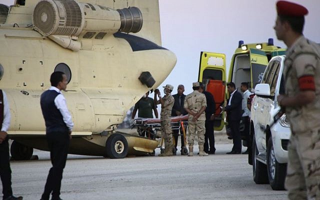 Egyptian emergency workers unload bodies of victims from the crash of a Russian aircraft over the Sinai Peninsula from a police helicopter to ambulances at Kabrit military airport, some 20 miles north of Suez, Egypt, Saturday, Oct. 31, 2015. (AP/Amr Nabil) Egyptian emergency workers unload bodies of victims from the crash of a Russian aircraft over the Sinai Peninsula from a police helicopter to ambulances at Kabrit military airport, some 20 miles north of Suez, Egypt, Saturday, Oct. 31, 2015. (AP/Amr Nabil)