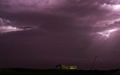 Lightning strikes during a thunderstorm in Beheira, 180 kilometers (112 miles) north of Cairo, Egypt, Sunday, Oct. 25, 2015. (AP Photo/Mahmood Shahiin)